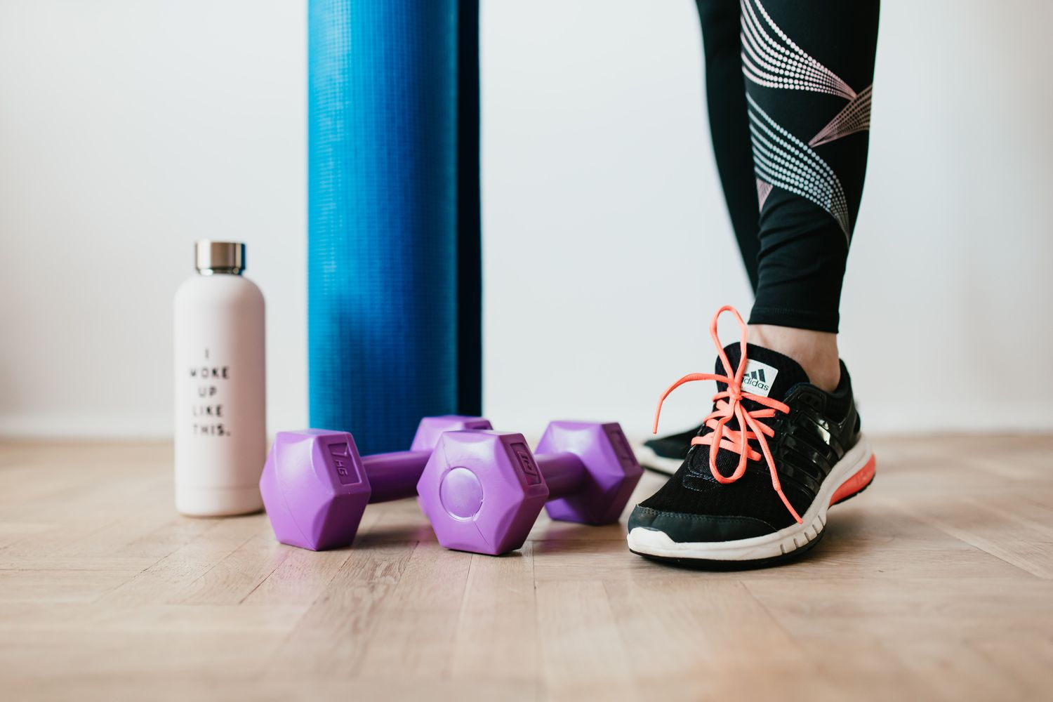 Home workout equipment on a wooden floor