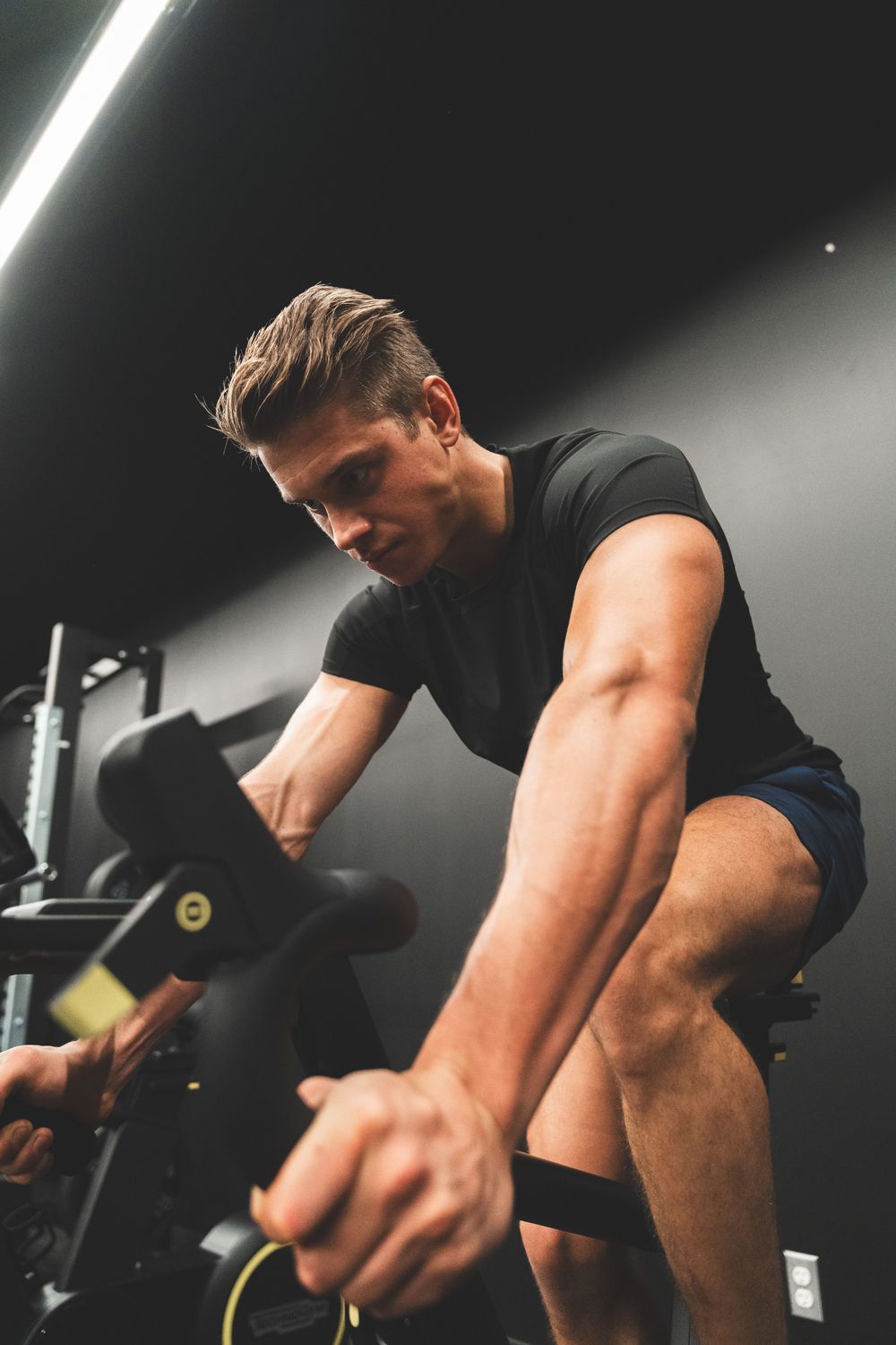 Man riding an indoor exercise bike
